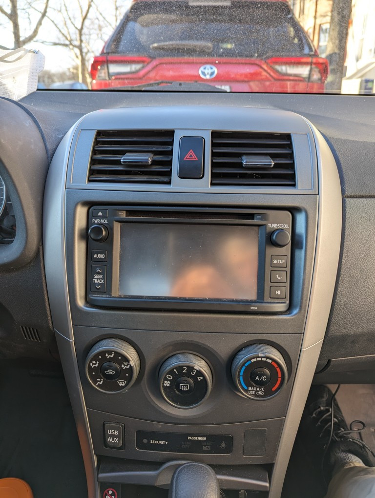 Completed replacement of the center console air vent in a 2013 Toyota Corolla.