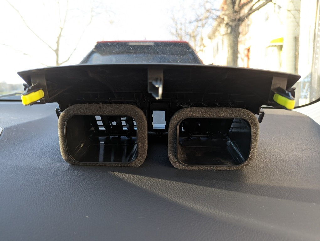 Different angle of the replacement center console air vent for a 2013 Toyota Corolla.