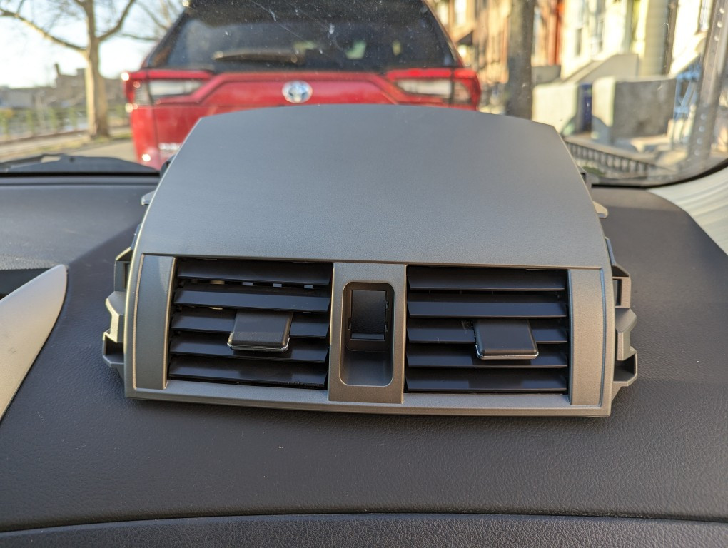 New replacement air vent assembly for a 2013 Toyota Corolla purchased online.