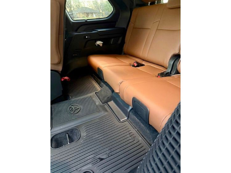 Third-row seating in the 2025 Toyota Sequoia, demonstrating passenger space and power recline feature.