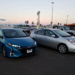 Side view of a blue 2017 Toyota Prius Prime highlighting its aerodynamic and distinctive styling