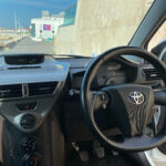 Interior view of the Toyota iQ showcasing its surprisingly spacious design.