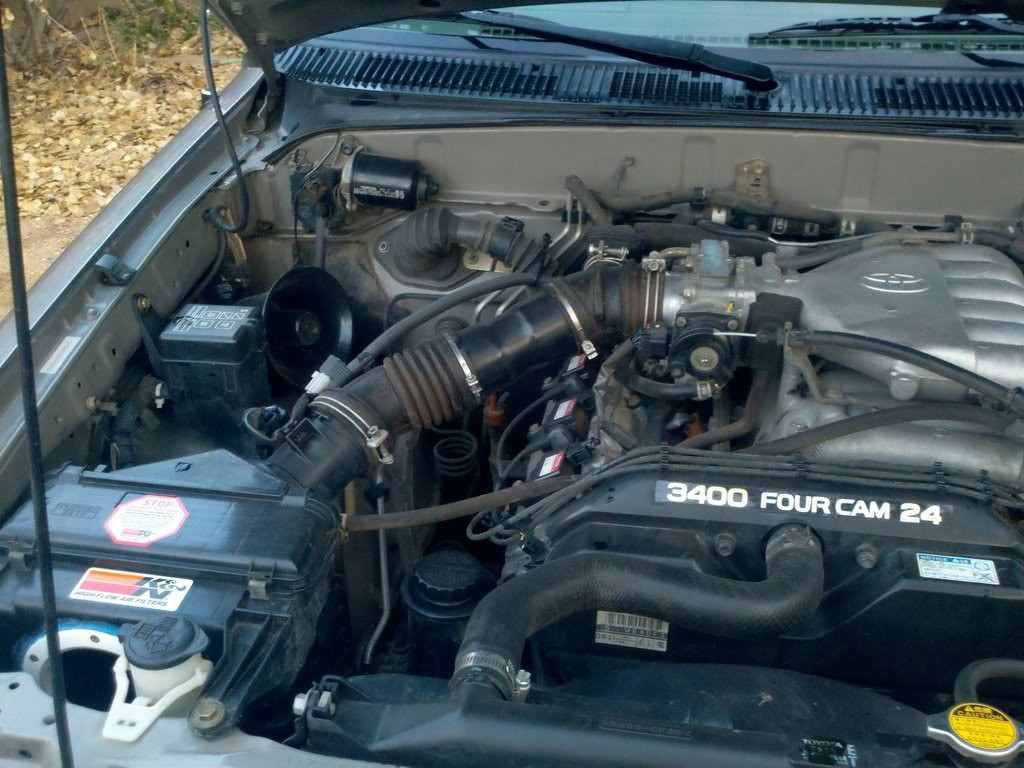 Toyota 4Runner engine bay showcasing the intake silencer removal (ISR) modification.