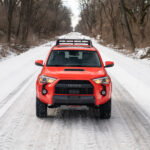 2023 Toyota 4Runner TRD Pro orange color parked in a driveway