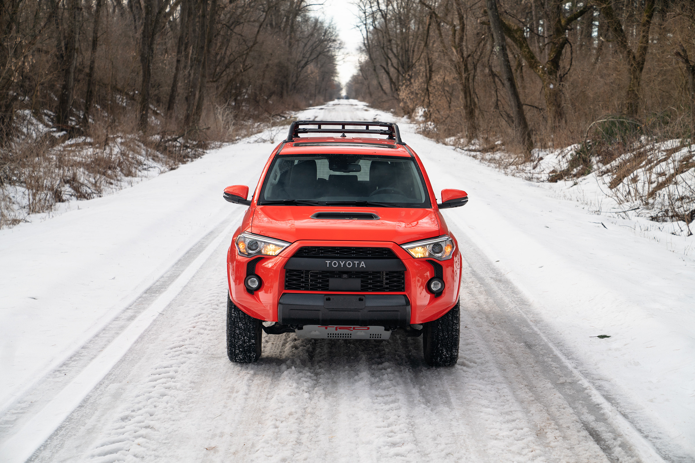 2023 Toyota 4Runner TRD Pro orange color parked in a driveway