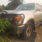 Close-up of the front grille and headlights of the 1992 Toyota Land Cruiser FJ80.