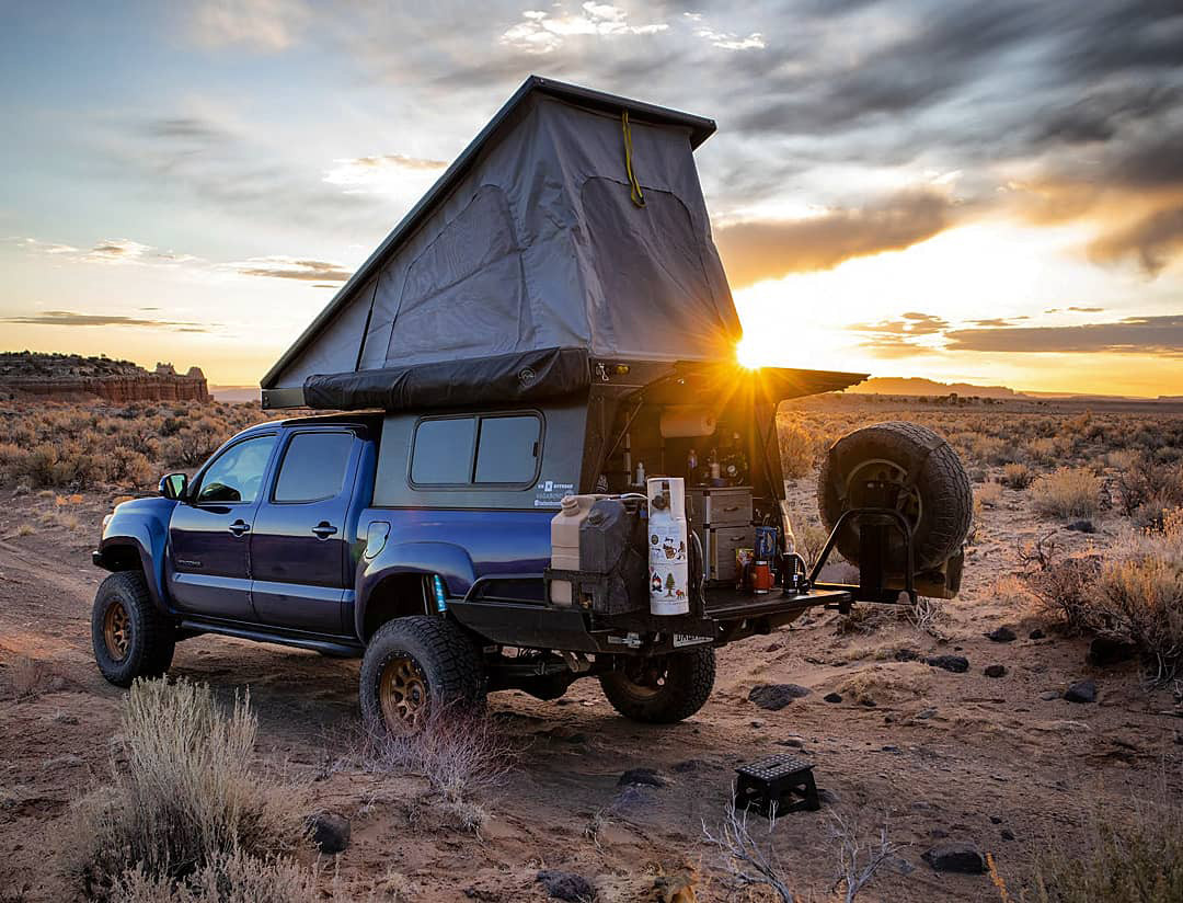 Toyota Tacoma Camper Setup HEST Rigs We Dig GMC Sierra Camper Buildout Back of truck camping set up with platform bed