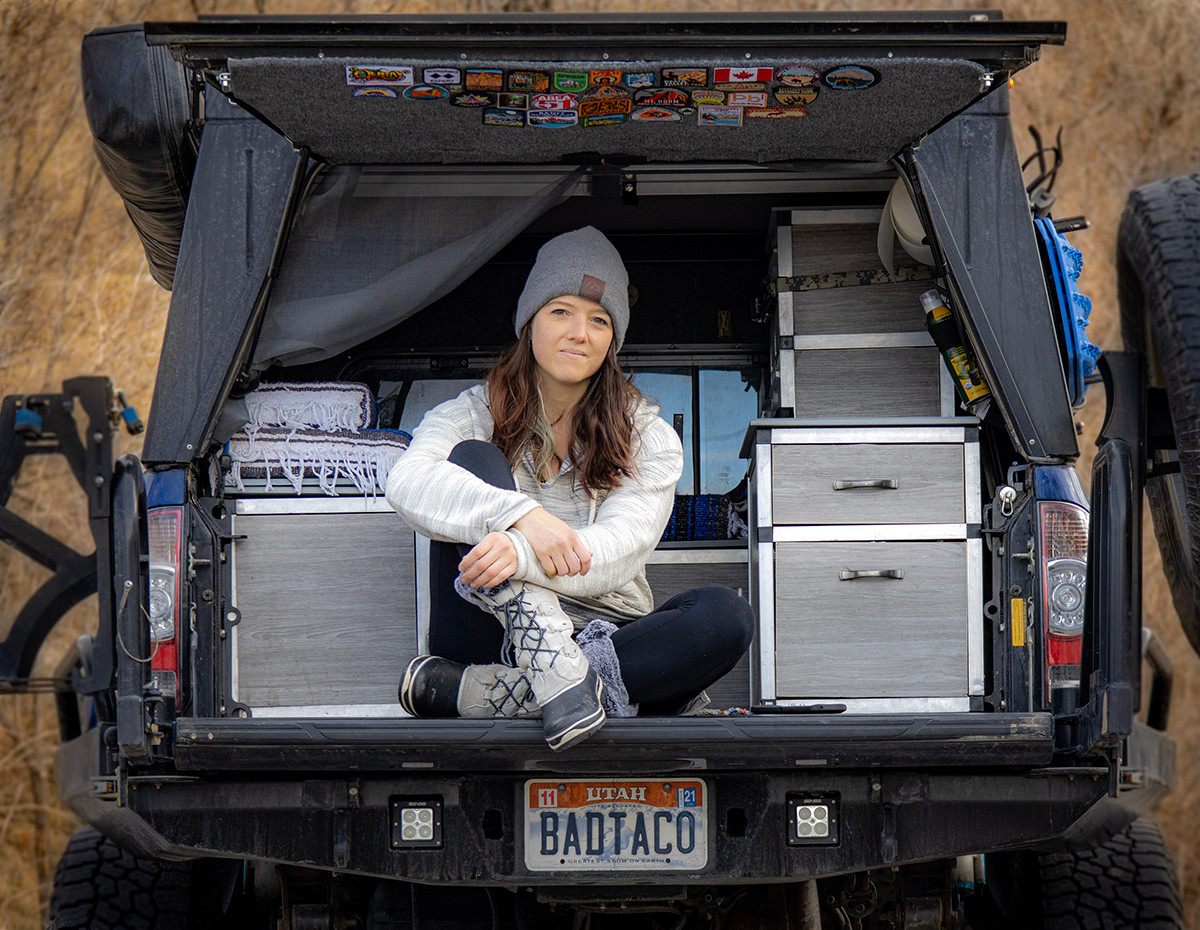 Cristin Whetten Badass Brunette HEST Rigs We Dig GMC Sierra Camper Buildout Back of truck Dually