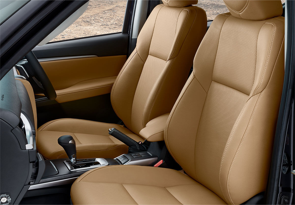 alt text: Interior view of the Toyota Fortuner showcasing its spacious seating and modern dashboard.