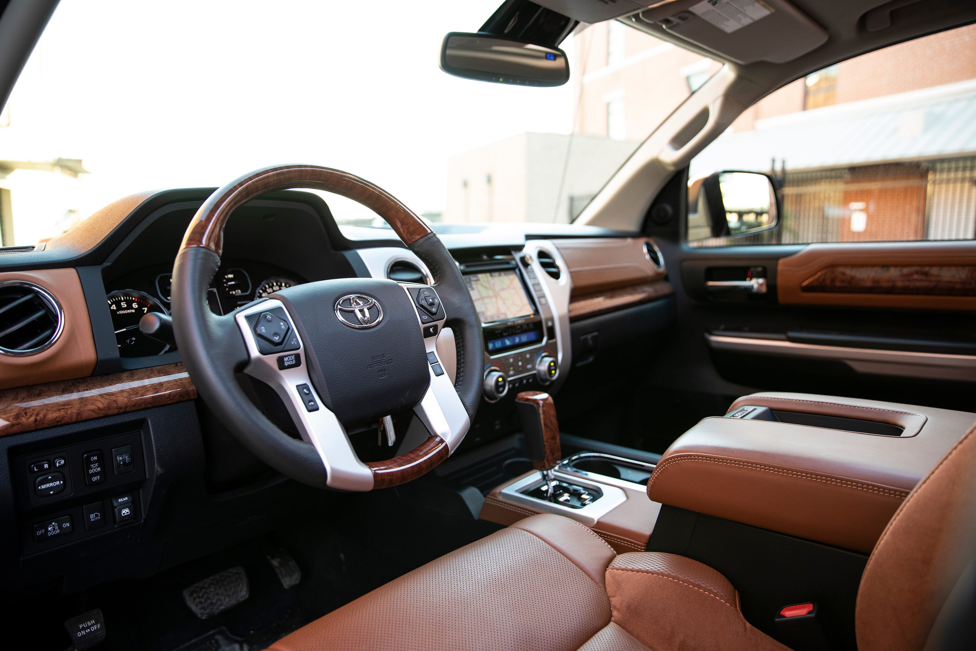 Side profile of 2020 Toyota Tundra 1794 Edition in Voodoo Blue showcasing its full-size dimensions