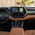 Interior of the 2020 Toyota Highlander showing the dashboard and infotainment screen