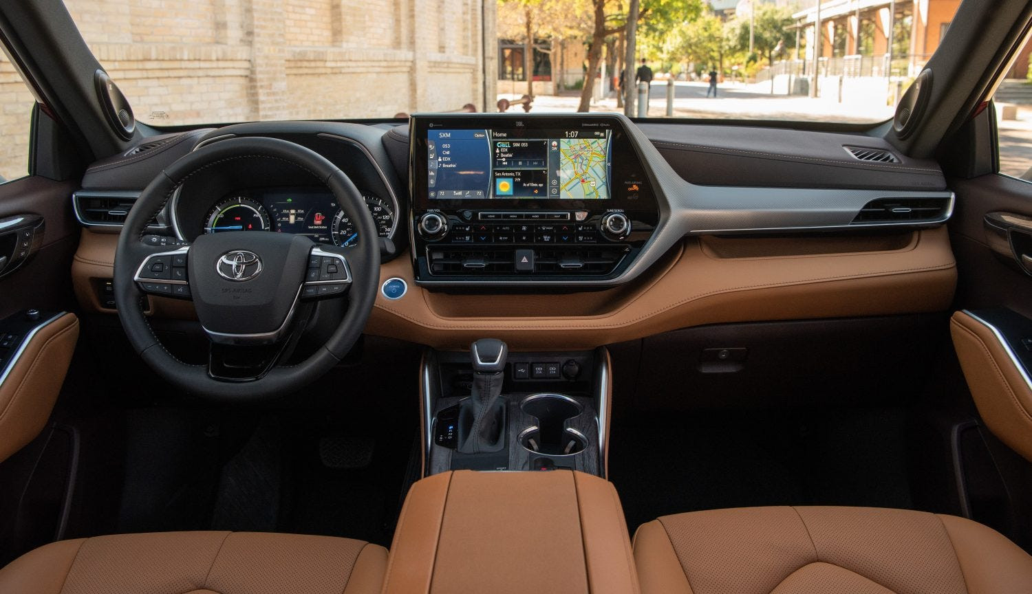 Interior of the 2020 Toyota Highlander showing the dashboard and infotainment screen