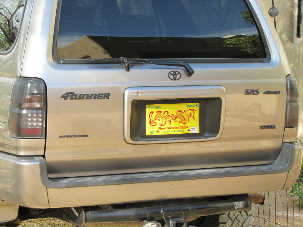 Toyota 4Runner emblems plasti-dipped in matte black.