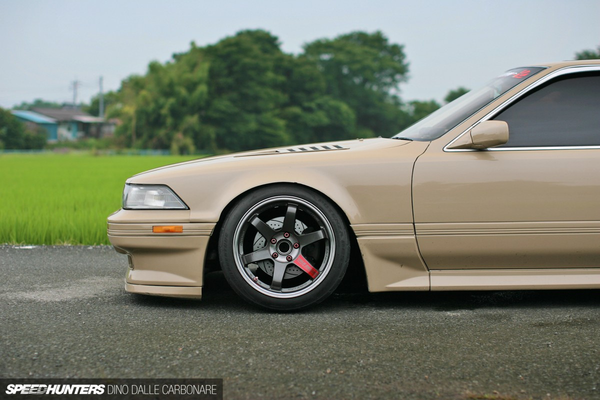 Rear view of the Toyota Soarer Z20 showing the JZA70 Supra spoiler and custom taillights