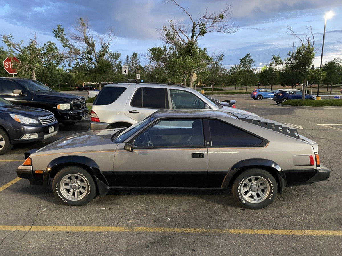 Rear view of a 1985 Toyota Celica GT-S showcasing its louvered rear window, taillights, and GT-S badging.