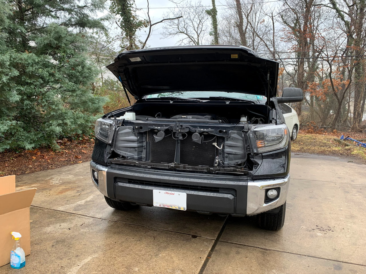 The updated black TRD Pro grille on a Toyota Tundra, providing a more aggressive and modern look.