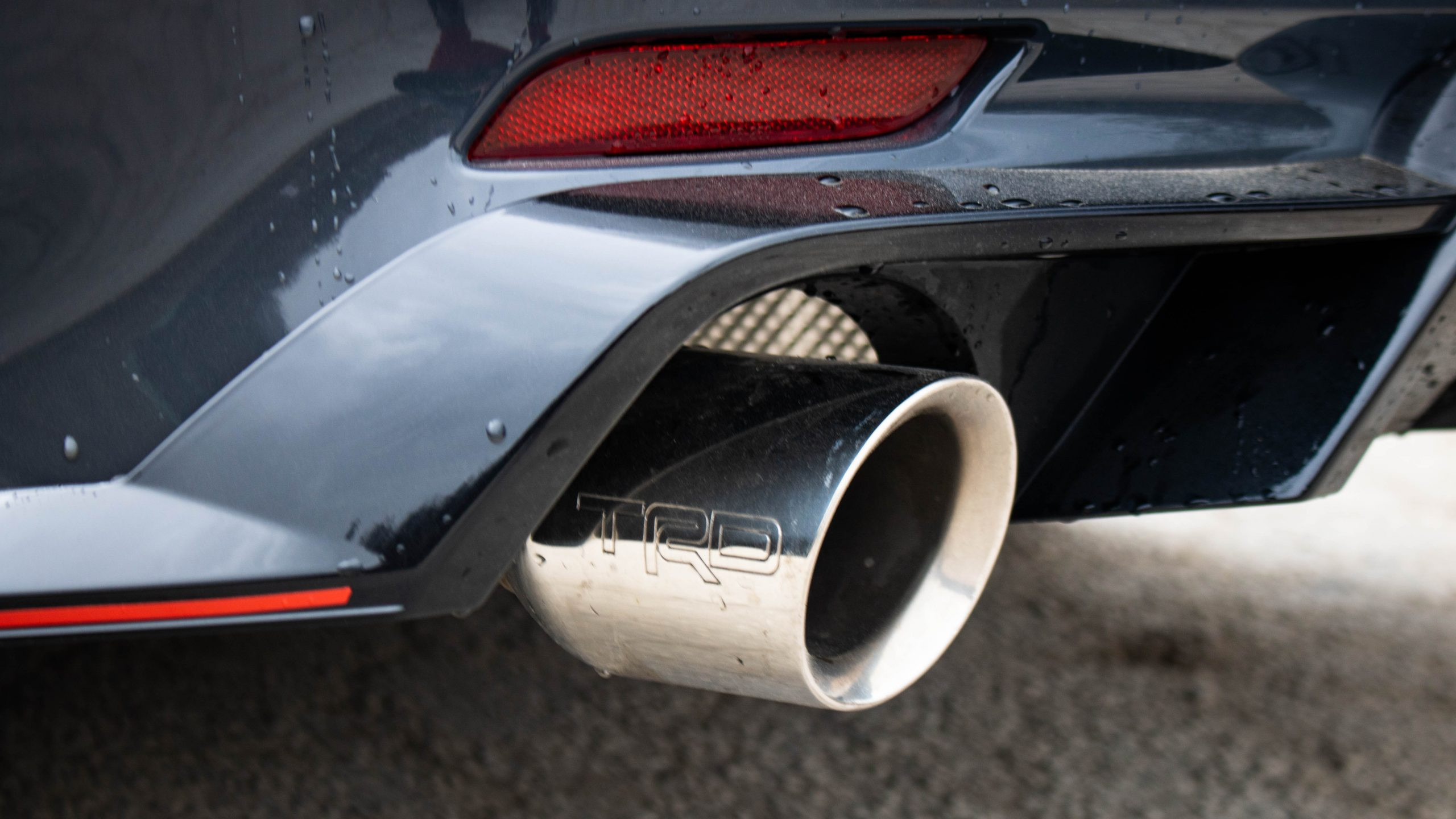 Side view of the 2024 Toyota Camry TRD V6 in motion, illustrating its handling and sporty suspension.