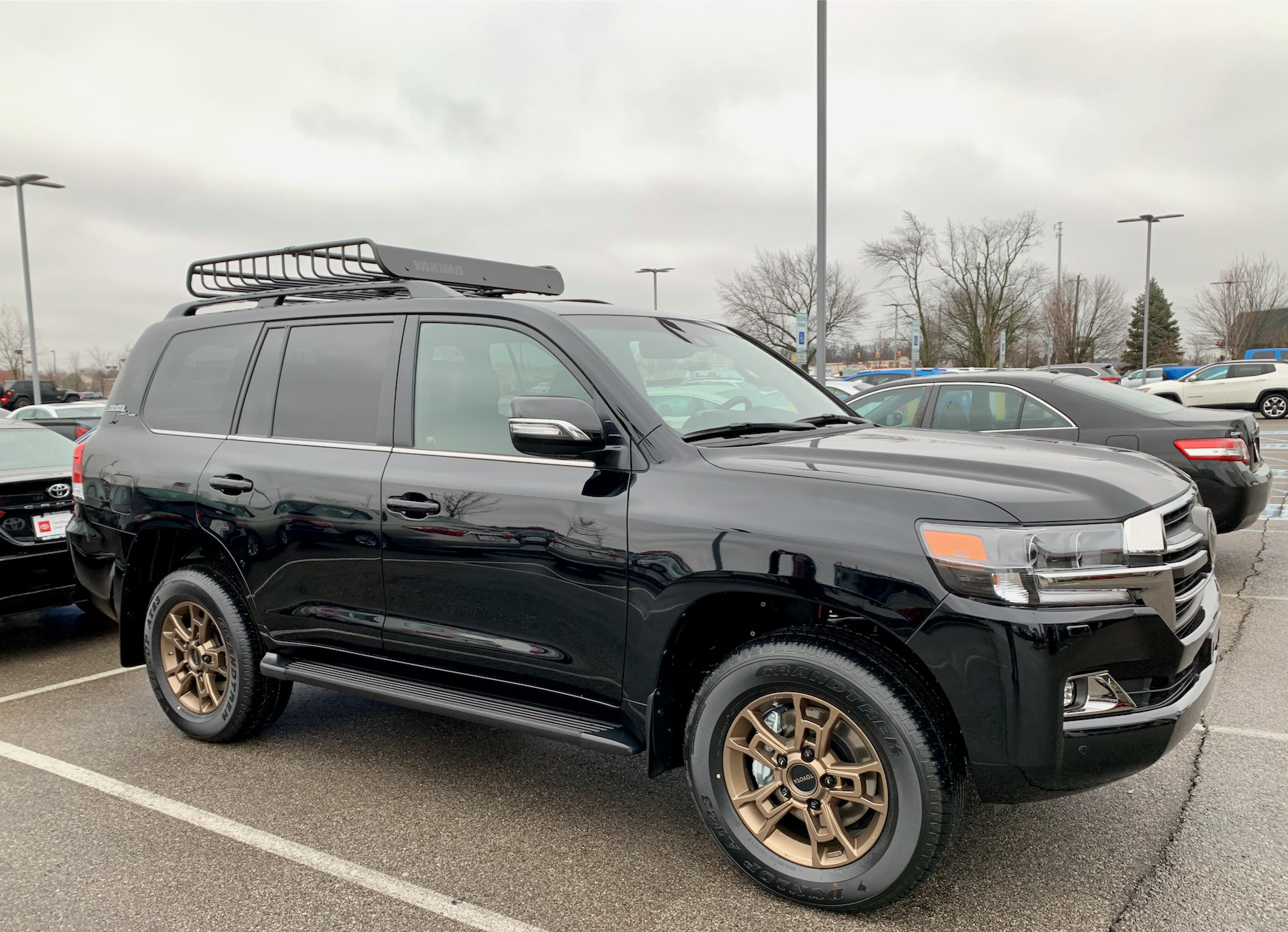 Dashboard view of the 2021 Toyota Land Cruiser, highlighting the interior and stock features.