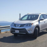 Exterior view of a silver 2015 Toyota RAV4. The alt text is: 2015 Toyota RAV4 XLE exterior styling.