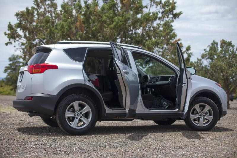 Interior view of the 2015 Toyota RAV4 showcasing the spacious rear seats. The alt text is: 2015 Toyota RAV4 XLE rear passenger space and legroom.