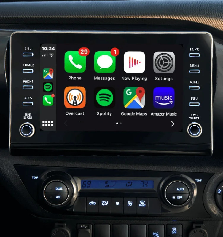 alt text:  A detailed view of the Toyota Hilux's dashboard, showcasing its infotainment system and control panel.