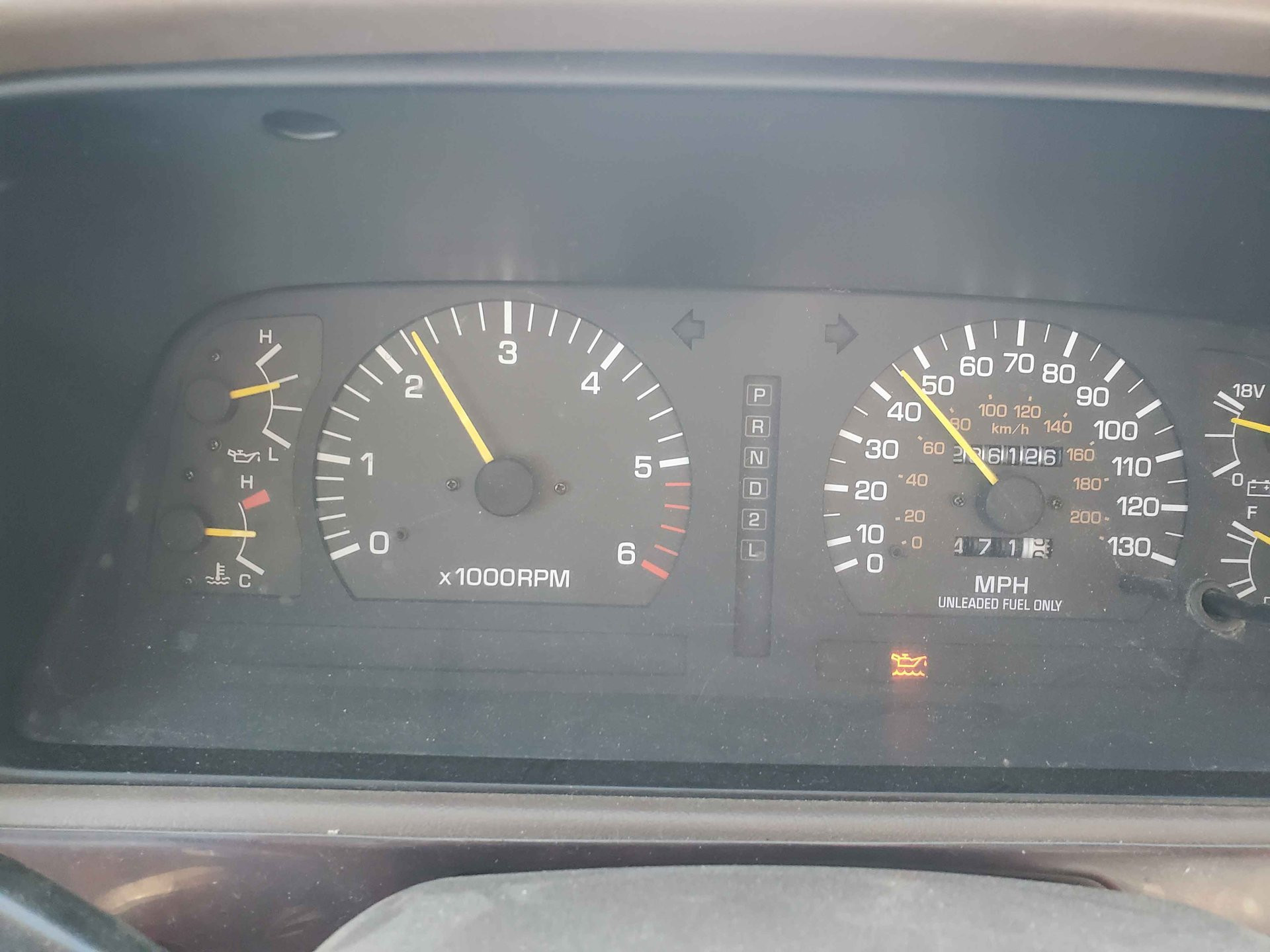 1995 Toyota Land Cruiser dashboard showing oil light and oil pressure gauge