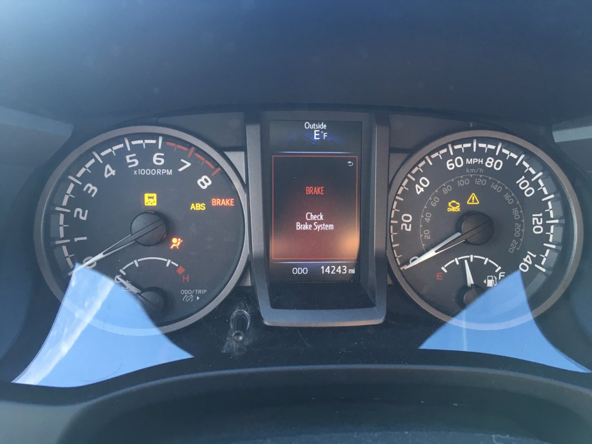 Brake Override Malfunction Warning Light in Toyota Tacoma dashboard