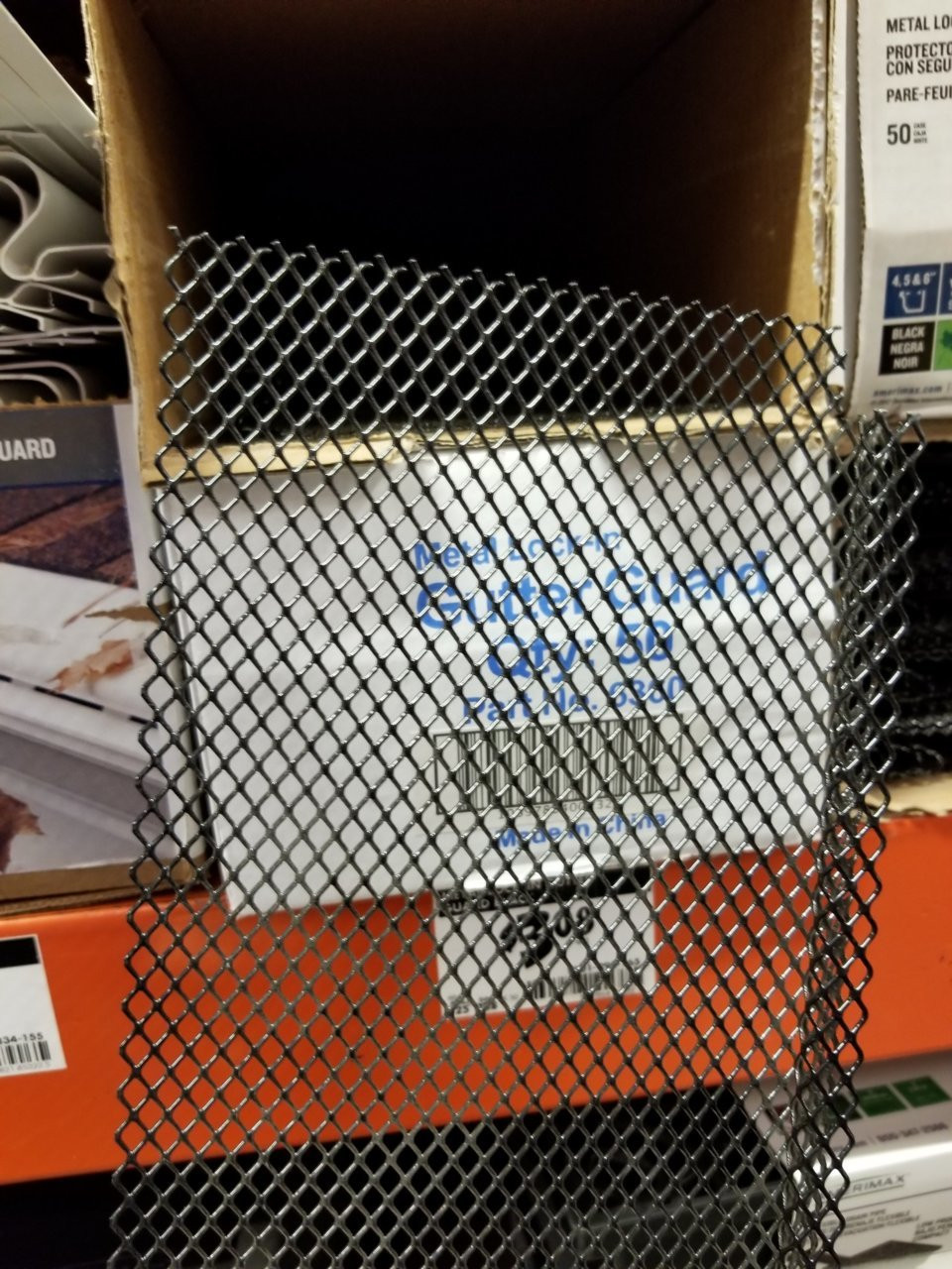 Metal gutter guard for mouse proofing