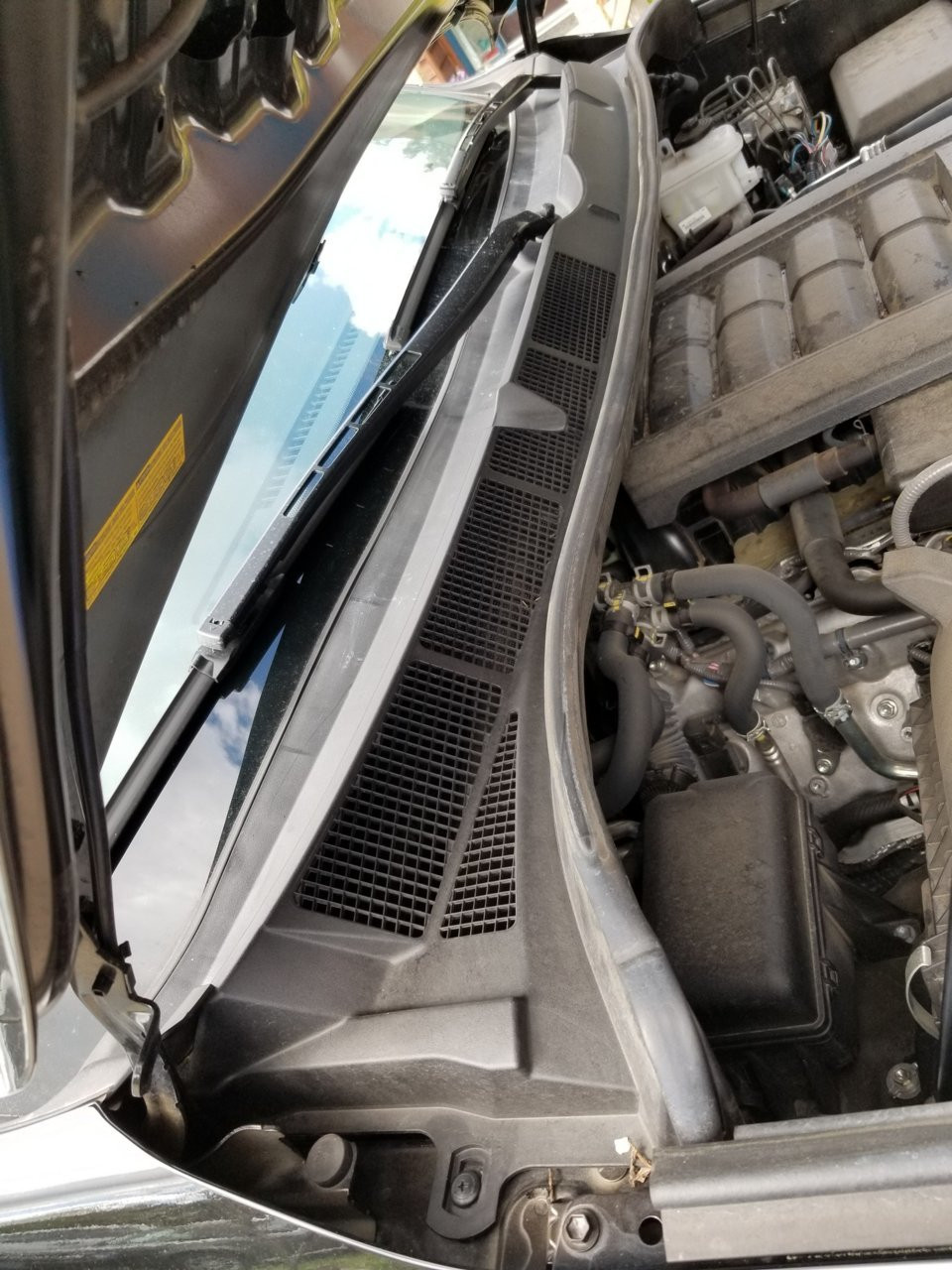 Passenger side after cowling removal for A/C intake access