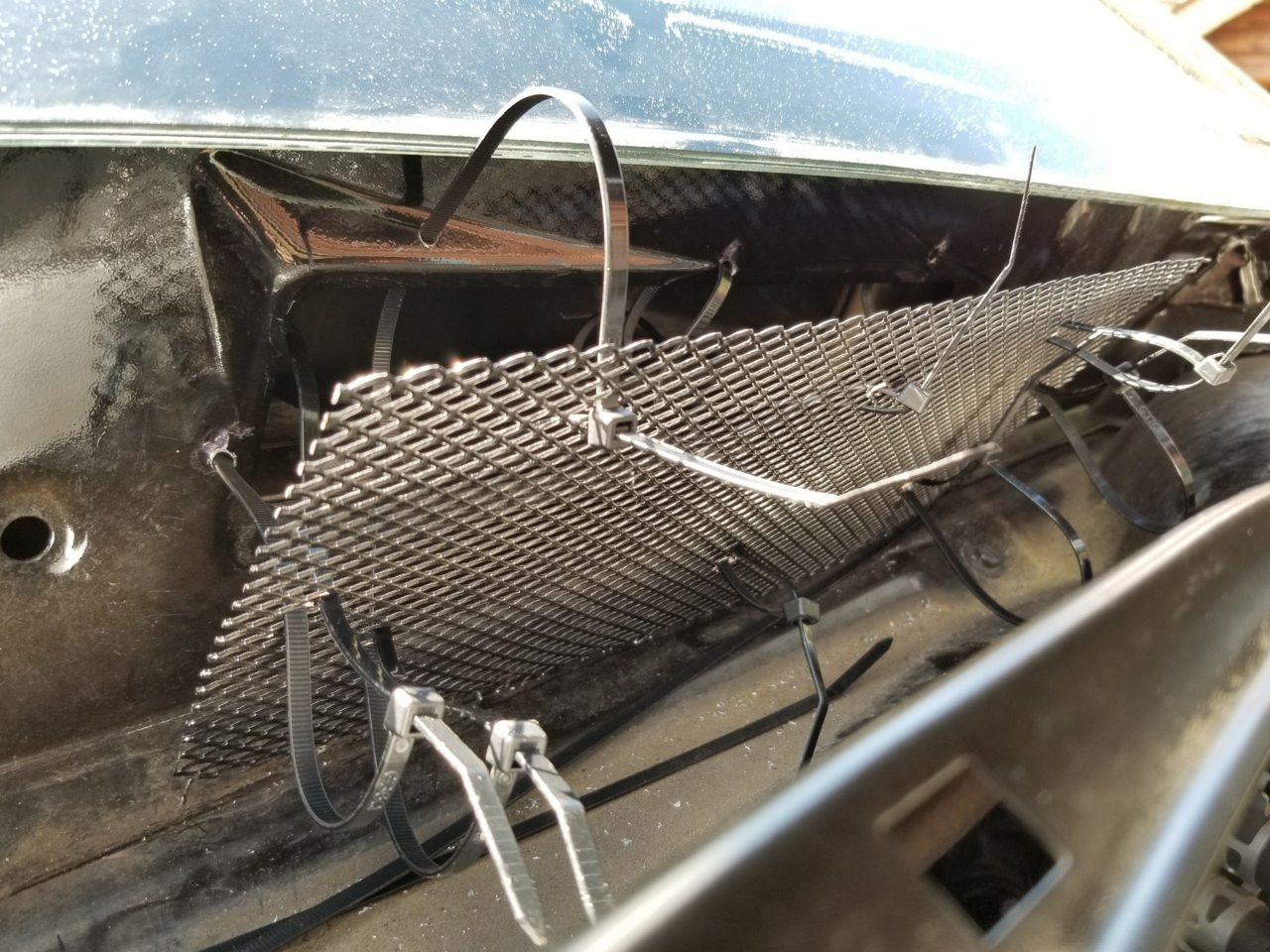 Attaching gutter guard with zip ties