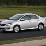 Toyota Corolla dashboard showcasing speedometer and RPM gauge, highlighting vehicle performance capabilities