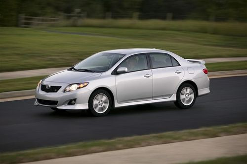 Toyota Corolla dashboard showcasing speedometer and RPM gauge, highlighting vehicle performance capabilities