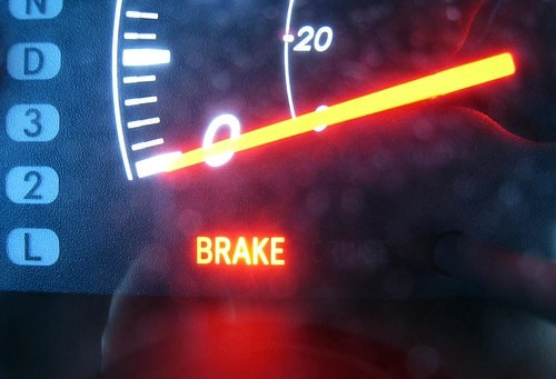 Illuminated Brake Light on Car Dashboard