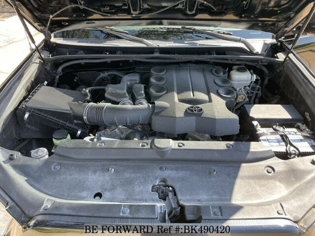 Black engine of toyota 4runner showcasing its robust mechanical components and straightforward design, contributing to its long-term reliability