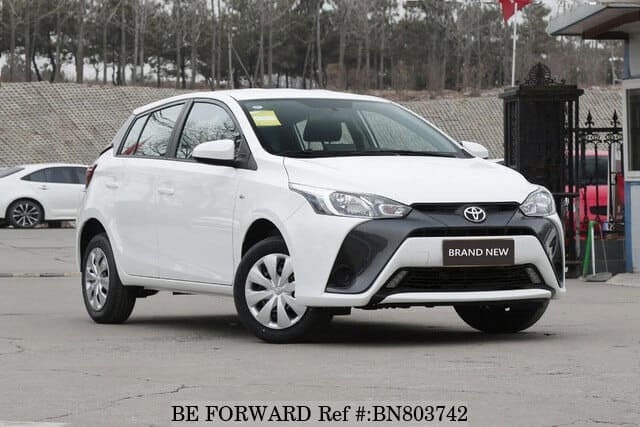 Toyota Yaris 2023 white frontside showcasing its aggressive design and modern styling