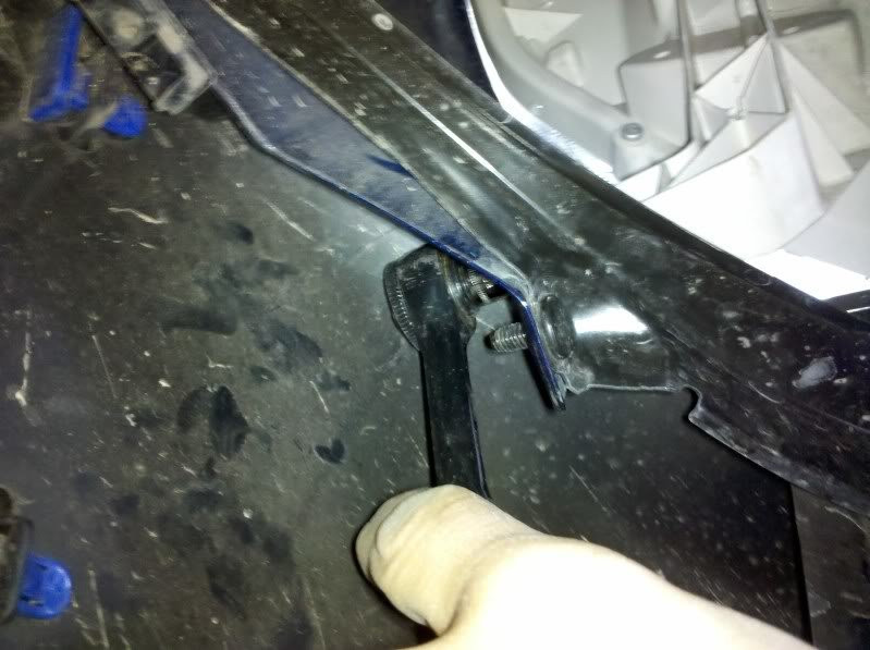 Location of headlight bolt