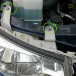 Toyota Tacoma headlight assembly with screws highlighted