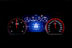 Modern light car mileage (dashboard, milage) isolated on a black background. New display of a modern car. Tire pressure - TSI.