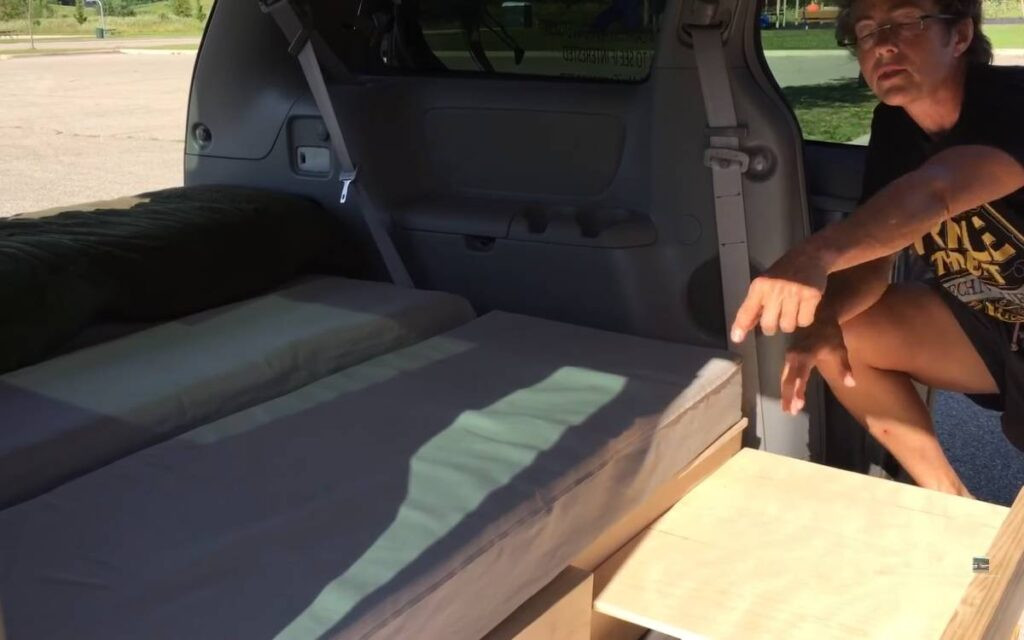 Kelly Showing Her Toyota Sienna Camper Conversion Bed System
