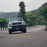 Toyota Hilux Champ Driving on A Road