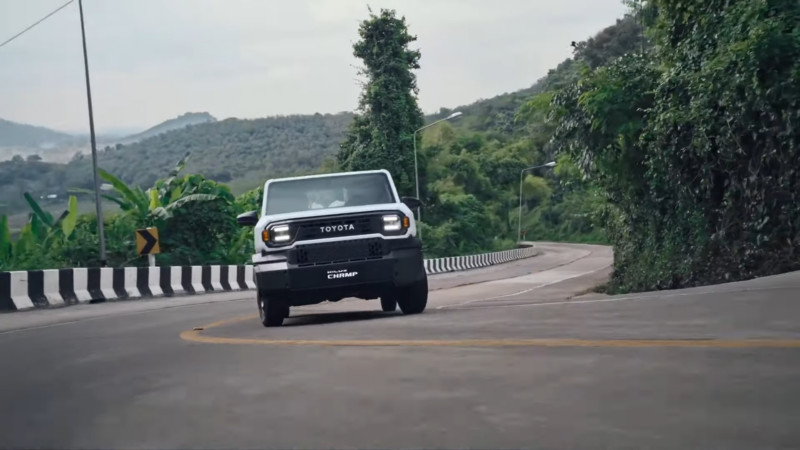 Toyota Hilux Champ Driving on A Road
