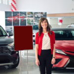 Jan from Toyota (Laurel Coppock) is a reliable girl-next-door whose upbeat approach to being a receptions