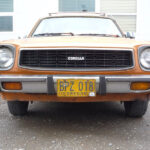 Toyota Corolla third-generation classic car in a parking lot