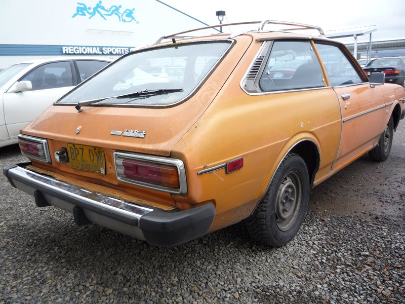 Close-up of the Toyota Corolla headlight and front grill