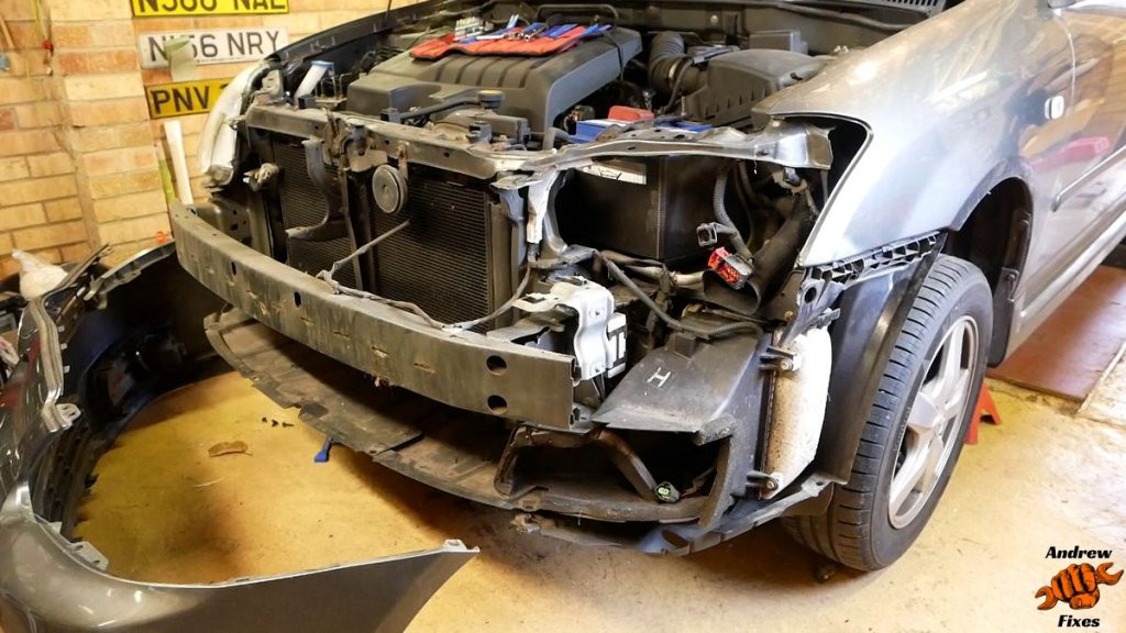 Toyota Corolla Headlight Replacement in Progress
